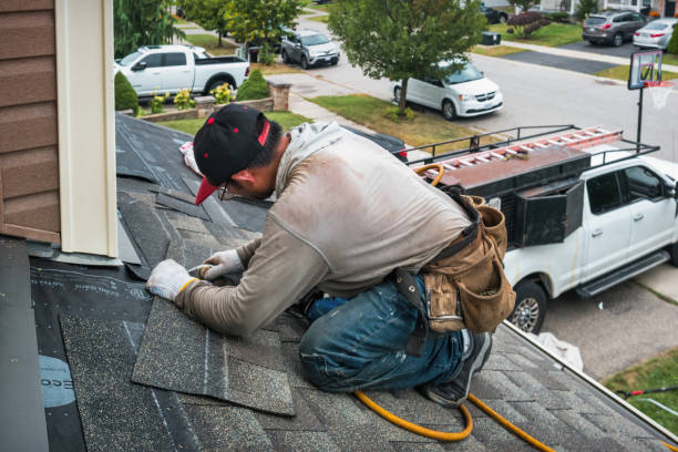 Professional Roofing technician working in Lexington, MA